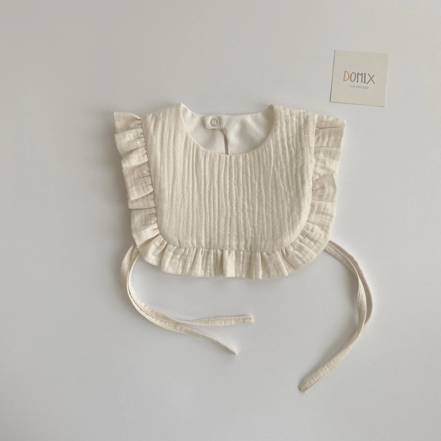 Shimmer Frill Bib - Domix