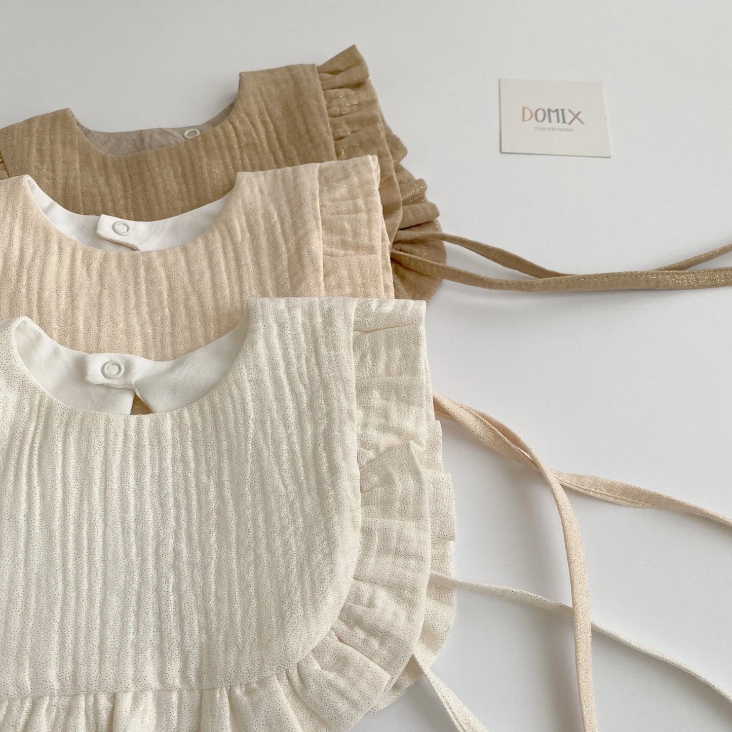 Shimmer Frill Bib - Domix