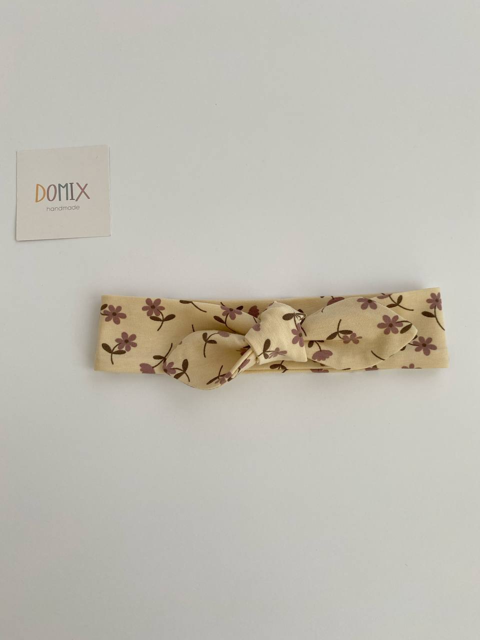 Stirnband mit floralem Knoten – weicher Jersey