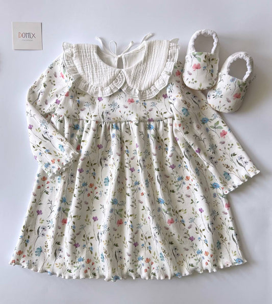 Robe bébé fleurie à col volanté