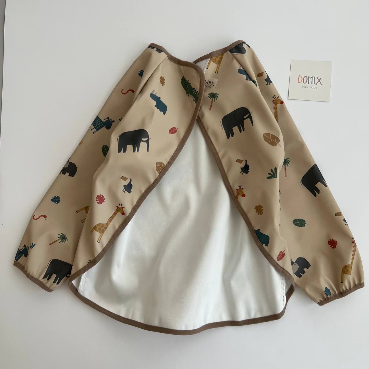 Children's jacket with animal pattern on a white background